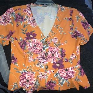Flora peplum top with buttons
